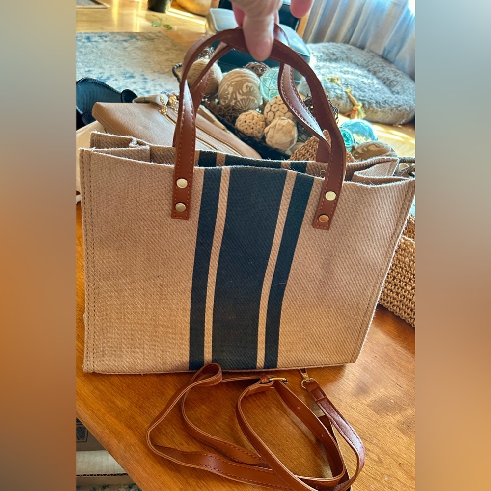 NWOT: Super cute canvas, heavy duty, comes with shoulder strap.